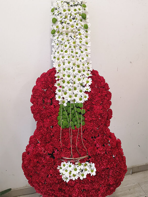 Flores funeral guitarra